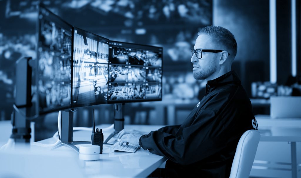 Live agent monitoring live surveillance camera feeds